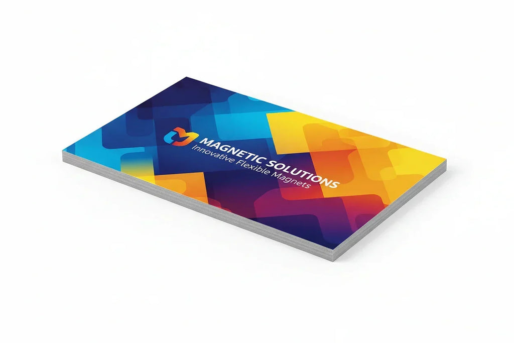 Colorful magnetic business card with geometric design on a white background
