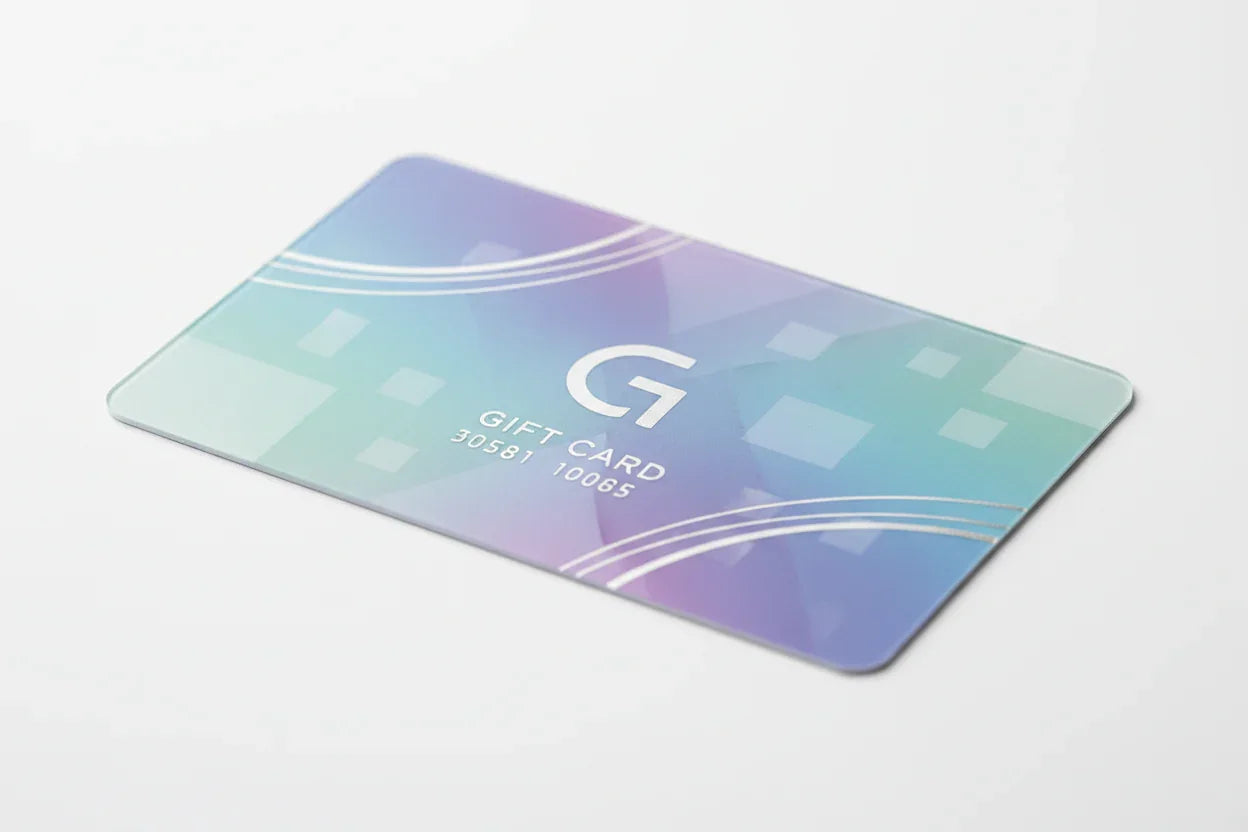Plastic gift card with geometric design on white background, ideal for custom printing