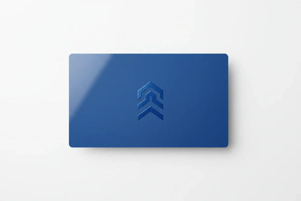 Blue rectangular business card with spot UV glossy logo on white background
