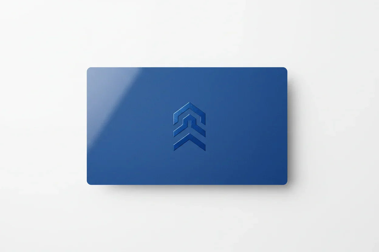 Blue rectangular business card with spot UV glossy logo on white background