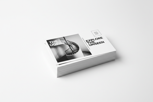 a stack of 4x6 postcards in printed in black and white on cardstock on a white background