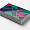 Stack of colorful business cards with UV coating and geometric design on white background