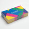 Stack of colorful matte business cards on a white background, custom printed design