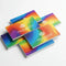 Stack of colorful, rectangular business cards with ultra-smooth finish on a white background