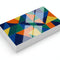Stack of color-printed business cards with glossy aqueous coating on white background