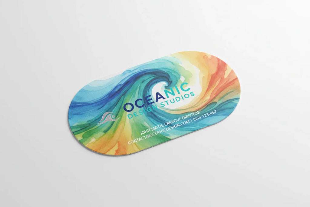 Oval-shaped business card with colorful abstract design on a white background