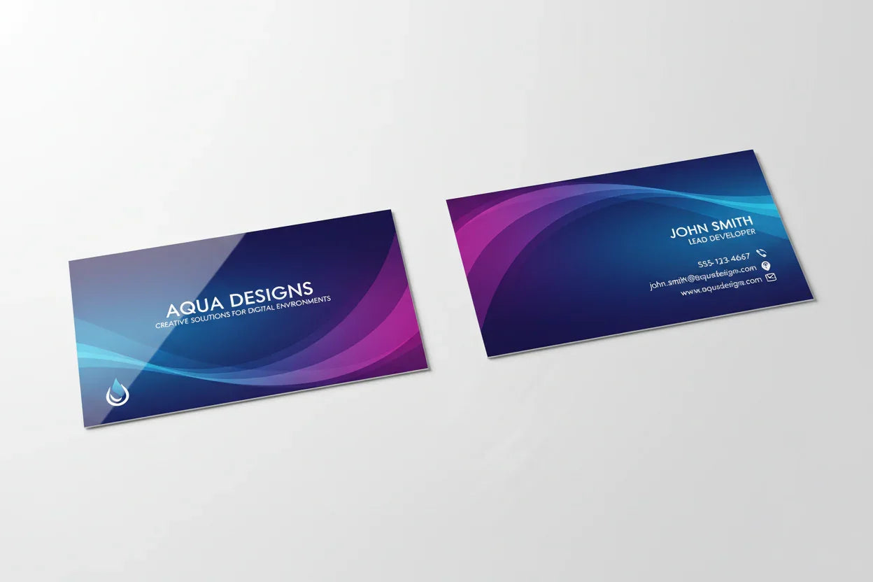 Two high gloss laminated business cards with colorful wave design on white background