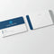 Two rectangular business cards, front and back, with blue accents and ample white space for notes.