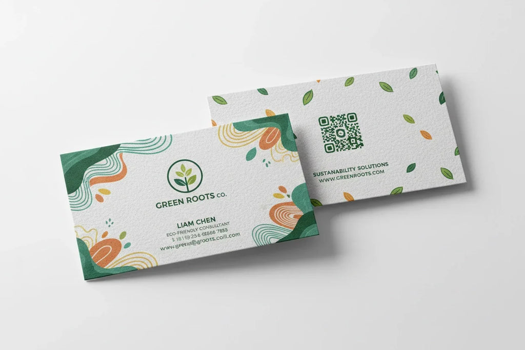 Two white hemp blend business cards with colorful prints, eco-friendly design, and QR code.